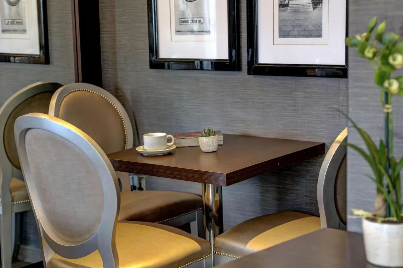 Table and chairs with coffee near Victoria Station